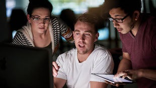 Cropped shot of computer programmers working on new code